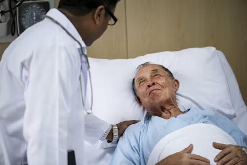 Doctor examining a diabetic patient's foot
